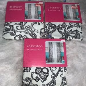 3 curtain panels white and black